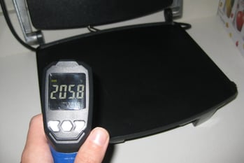 A hand holding a digital thermometer

AI-generated content may be incorrect.