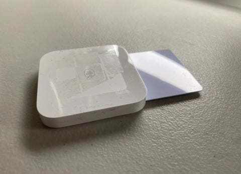 A white square object with a square object in it

AI-generated content may be incorrect.